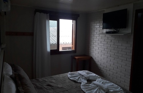 Gramado Apartamento | Pousada dos Passaros Gramado 203 - Free Wi-Fi