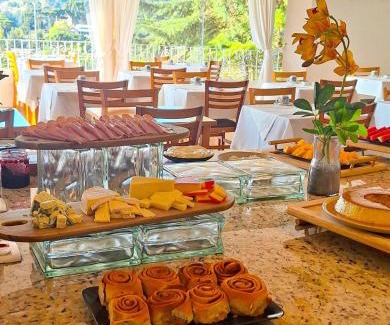 Vila Everest Hotel | Pousada Itália Moderna