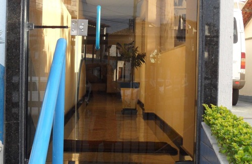Vila Nova Apartamento | LO MEJOR * A dos cuadras de Praia Forte w / AR, WiFi, Smart TV, Sky, hamaca, garaje