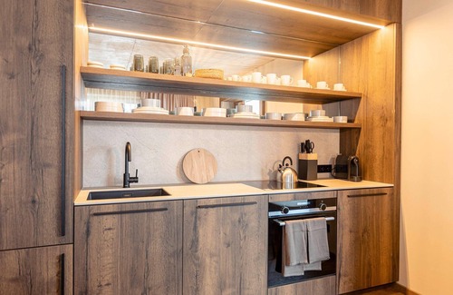 Haus im Ennstal Apartamento | Apartamento vacacional premium con balcón y sauna