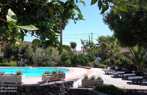 El Paso Apartamento | pretty apartment with sun terrace in the subtropical garden with WiFi and pool