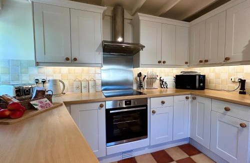 Quenington Casa | Pretty Cotswold Cottage with garden near Bibury