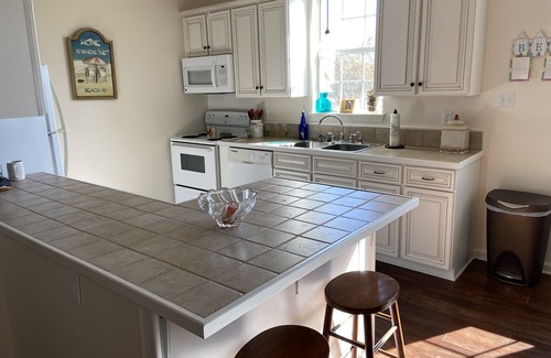 Waveland Casa | Pretty raised three bedroom beach home awaits you! A short 3 min. walk to beach!