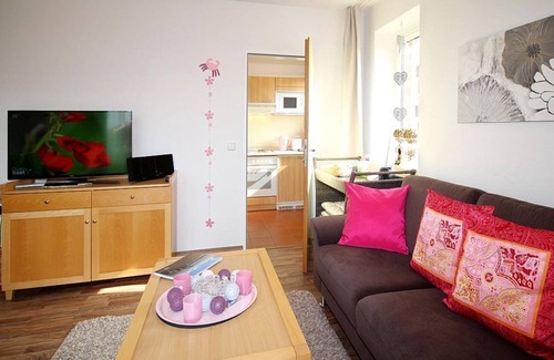 Schillig Apartamento | Pretty vacation apartment by the sea with balcony and view of the green North Sea dike - Hus