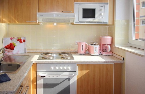 Schillig Apartamento | Pretty vacation apartment by the sea with balcony and view of the green North Sea dike - Hus