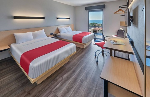 Zona hotelera del norte Hotel | Prime Location Room with Cozy Touches Ideal for Exploring Beaches