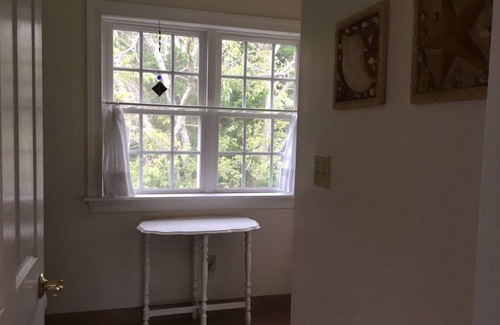 Cape May Point Casa | Pristine, Cozy, 4 bedroom Beach Cottage with a 40 foot screened in front porch!