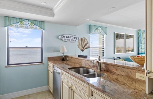 Punta Rassa Condominio | Pristine Waterfront Residence with Panoramic Water Views - Pool Open!
