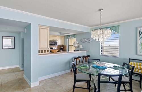Punta Rassa Condominio | Pristine Waterfront Residence with Panoramic Water Views - Pool Open!