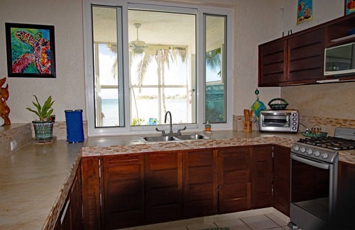 Akumal Condominio | LUJOSO PISO EN PLANTA BAJA FRENTE A LA PLAYA c / PISCINA, VISTAS, PRIVACIDAD Y VALOR!