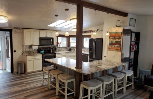 Priest River Casa | Private Cove River Home with water toys, 200 foot sandy beach and boat dock.