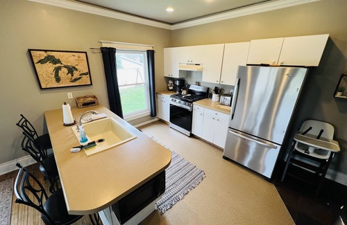 East Jordan Casa | Private DOCK & Beach on Lake Charlevoix / Pontoon Rental / GolfCart / RV Parking