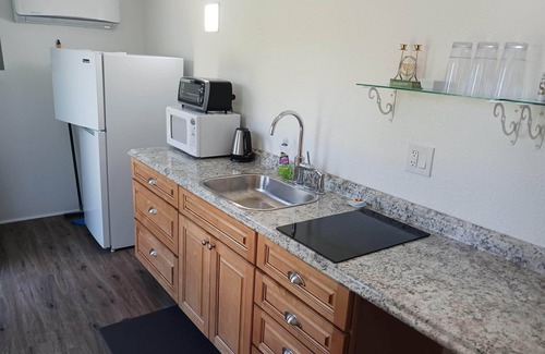 Greenwood Village Casa | Private entrance master suite with a kitchenette