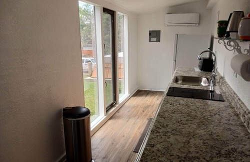 Greenwood Village Casa | Private entrance master suite with a kitchenette