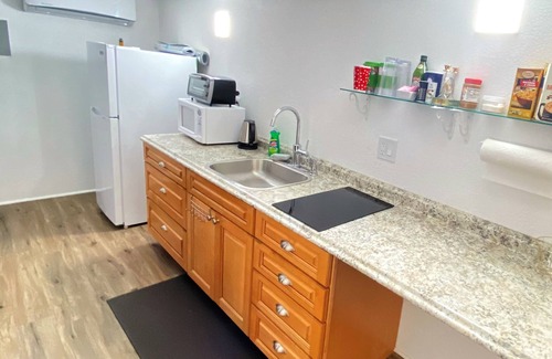 Greenwood Village Casa | Private entrance master suite with a kitchenette