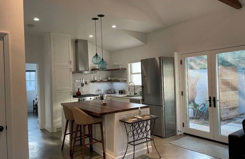 Sunset Park Casa | Private guesthouse with gated pathway entrance and private yard.