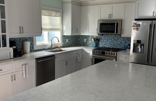 Silver Beach Casa | Private heated pool and spacious yard. 5 minute walk to the beach.