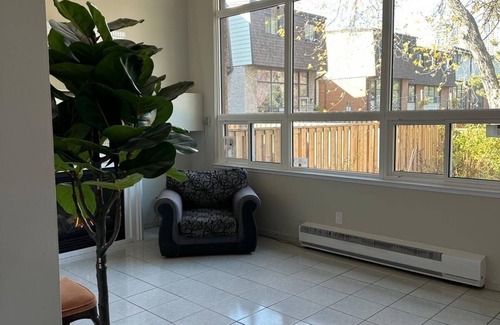 Mississauga Valleys Casa | Private home with large bedroom and spacious common areas with patio.