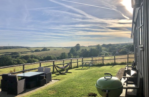Bude Cabina | Private Hot Tub, Heating throughout plus Wood Burner, Rural & Sea Views