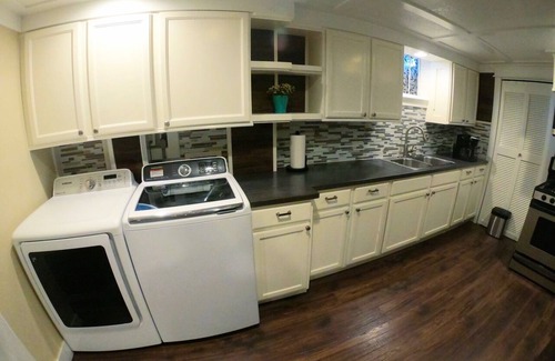 Harvey Park South Casa | PRIVATE HOT TUB! Stunning updated downstairs home- Amazing Location