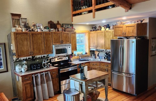 Farwell Cabina | Private lake, with private sandy beach. Beautiful five bedroom.