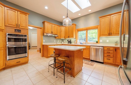 Dublin Casa | Private lakefront home with dock, forest views, balconies, game room, and cozy indoor charm