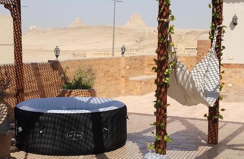 Pyramids Gardens Apartamento | Private rooftop with jacuzzi and pyramids view
