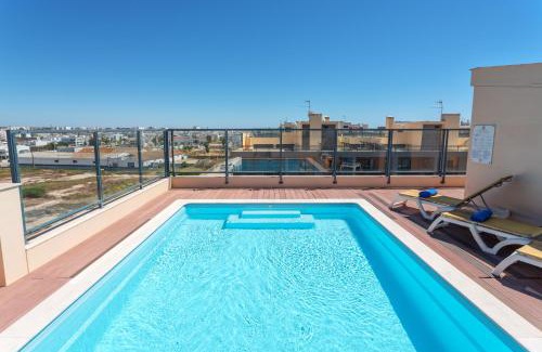 Olhao Apartamento | Privilege Apartment Deborah with Rooftop Pool, Village Marina - Olhão