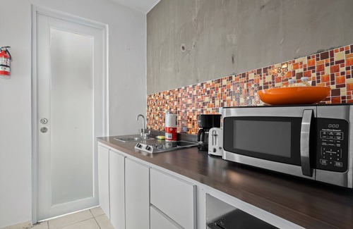 Punta Las Marias Apartamento | Puerto Rico Beachside Rental w Pool Otium Rentals