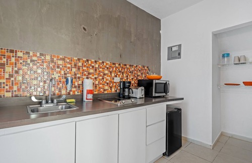 Punta Las Marias Apartamento | Puerto Rico Beachside Rental w Pool Otium Rentals