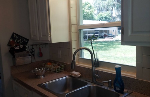 Sylvan Shores Casa | QUAINT HOME WITH VIEW OF LAKE CLAY ACROSS THE STREET FROM BOAT LAUNCH/DOCK