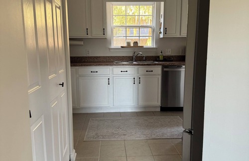 Beaufort Casa | Quaint Lady’s Island home with a large fenced in yard shaded by a mossy oak!