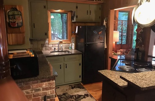 Mountain Rest Cabina | Quaint two bedroom cabin just a few steps away from and on Mountain Rest Lake.