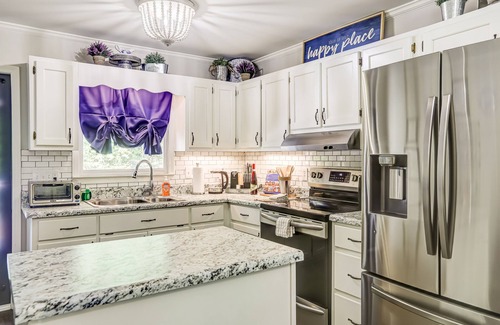 Epworth Cabaña | Quaint wooded escape with wraparound deck, firepit, & fast WiFi - dog-friendly