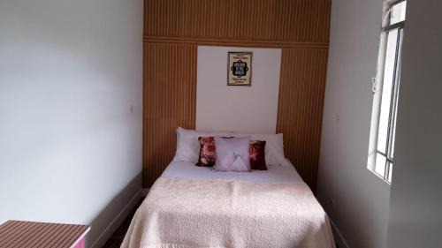 Merces Casa | Quarto amplo no Portão