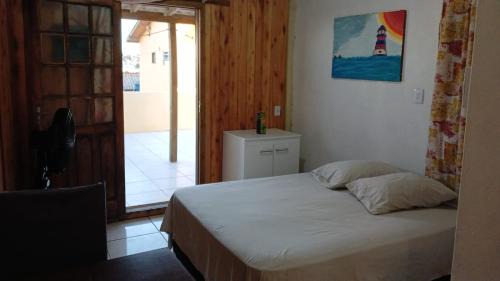 Vila Nova Apartamento | Quarto com banheiro