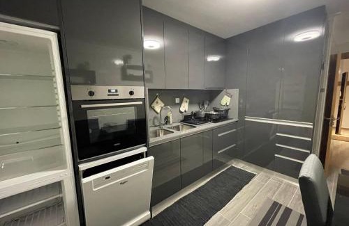 Palhais Casa | Quarto com wc privado, cozinha e sala