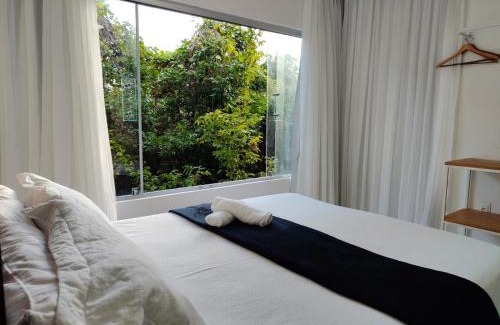Pescaria Apartamento | Quarto e sala pratagy