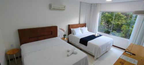 Pescaria Apartamento | Quarto e sala pratagy