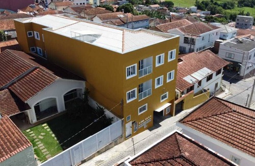 Paraisopolis Apartamento | Quarto Família Superior na Pousada Verissimus