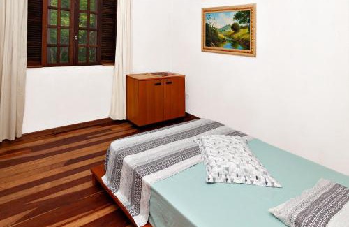 Pilarzinho Casa | quarto Refúgio no Bosque
