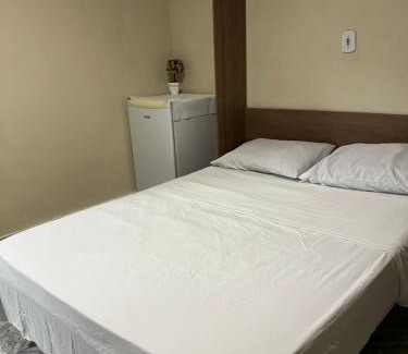 Jardim Primavera Casa | Quarto suite em Caraguatatuba