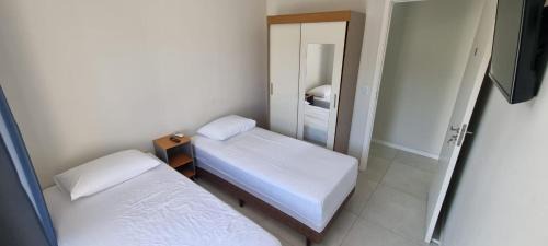 Ribeirao da Ilha Apartamento | Quartos Confortáveis em casa compartilhada - 5 min Aeroporto Internacional
