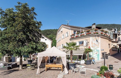 Muhlbach Apartamento | Quiet and modern vacation oasis in the middle of the village with dream views, garden & pool