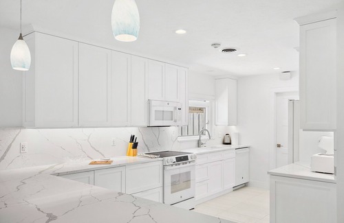 Saint Armands Key Casa | Quiet peaceful home on the canal with a dock; 2 minute walk to St Armands Circle