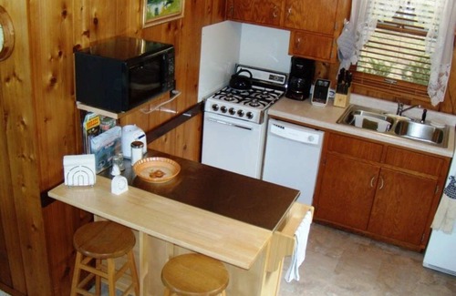 Poynette Cabaña | Quietwater Cottage-Scenic, On the Water, Nature & Birding, ¡Tranquilo! Bañera de hidromasaje y sauna
