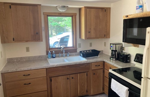 Sturgeon Bay Cabaña | R&S Lakeside Cottage Beautiful Large Sand Beach Door County Limestone Fireplace