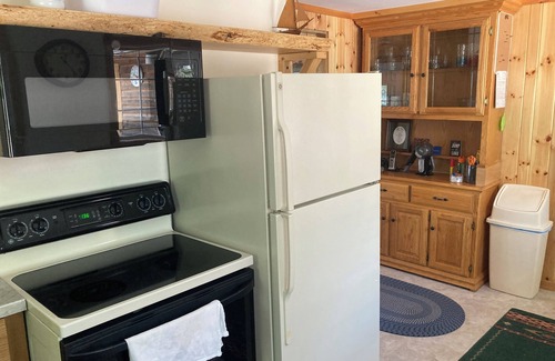 Sturgeon Bay Cabaña | R&S Lakeside Cottage Beautiful Large Sand Beach Door County Limestone Fireplace