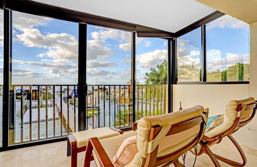 Key Largo Casa | Rare Bayfront End Unit in Moon Bay, Unmatched Sunsets, Boat Slip, Pool, Beach