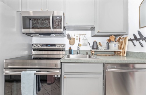Downtown Casa | Rare Find! Boutique Style Townhouse on the Creek!